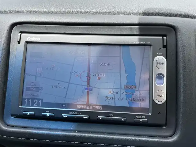 ホンダ ヴェゼル ハイブリッド X 福島県 2015(平27)年 12.6万km モルフォブルーP (株)IDOMが運営する【じしゃロン福島店】の自社ローン専用車両になります。こちらは現金またはオートローンご利用時の価格です。自社ローンご希望の方は別途その旨お申付け下さい/純正メモリナビ（VXM-155VSi）/ワンセグテレビ/バックカメラ/モデューロエアロ/革巻ステアリング/ステアリングリモコン/ドライブレコーダー/パドルシフト/ＥＴＣ/車両接近アラーム/フロントフォグランプ