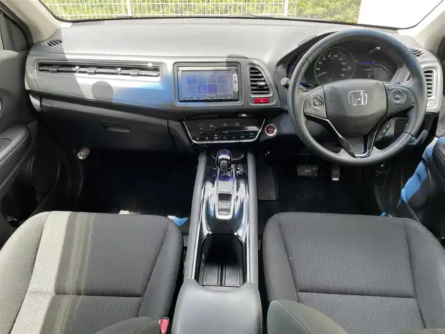 ホンダ ヴェゼル ハイブリッド X 福島県 2015(平27)年 12.6万km モルフォブルーP (株)IDOMが運営する【じしゃロン福島店】の自社ローン専用車両になります。こちらは現金またはオートローンご利用時の価格です。自社ローンご希望の方は別途その旨お申付け下さい/純正メモリナビ（VXM-155VSi）/ワンセグテレビ/バックカメラ/モデューロエアロ/革巻ステアリング/ステアリングリモコン/ドライブレコーダー/パドルシフト/ＥＴＣ/車両接近アラーム/フロントフォグランプ