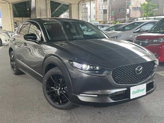 マツダ ＣＸ－３０ 20S ブラックトーンED 埼玉県 2023(令5)年 0.4万km マシーングレープレミアムM スマートブレーキサポート/・AT誤発進抑制制御/・レーダークルーズコントロール/・パーキングセンサー（フロント・リア）/・車線逸脱警報システム/・レーンキープアシスト/・ブラインドスポットモニタリング/・接近車両検知/マツダ純正SDナビ/・Bluetooth/・バックカメラ/・360度カメラ/アクティブドライビングディスプレイ/マツダ純正18インチアルミホイール/アドバンストキーレスエントリーシステム/・ブラックエンジンスタートリング/パワーバックドア/パドルシフト/LEDヘッドライト/・オートライト/ワンオーナー/新車保証書/取扱説明書