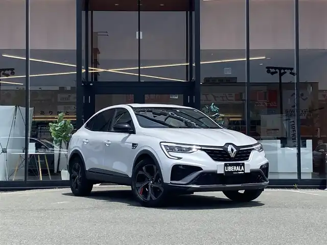 ルノー ルノー アルカナ RSライン E-テックハイブリッド 福岡県 2022(令4)年 2.6万km 白 ・アダプティブクルーズコントロール/・USB/Bluetooth/AUX/AppleCarPlay/・全方位カメラ/・社外前後ドライブレコーダー/・社外ETC/・純正18AW/・プッシュスタート/・パーキングアシスト/・スマートキー/・パワーシート/・オートライト/・LEDライト/・ハンドルヒーター