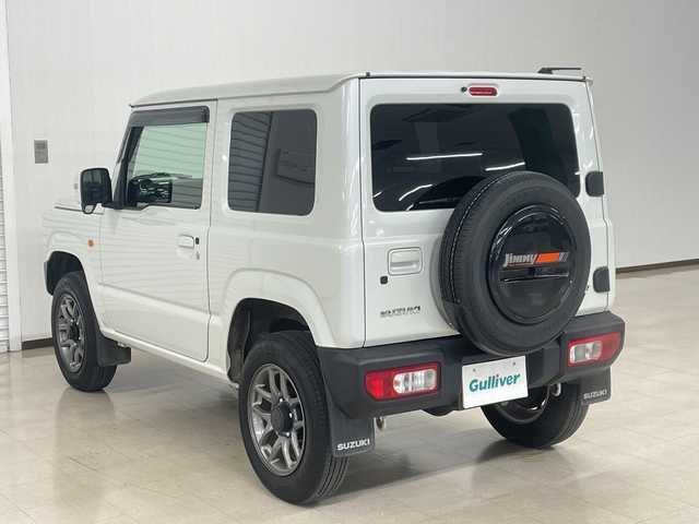 スズキ ジムニー XC 熊本県 2023(令5)年 2.6万km ピュアホワイトP 衝突軽減システム　/社外ナビ(ＣＤ/ＤＶＤ/ＴＶ)　/シートカバー　/前席シートヒーター　/クルーズコントロール/ＬＥＤヘッドライト　/ヒーテッドドアミラー　/オートライト　/背面タイヤ　/前後ドライブレコーダー/4WD　/純正アルミホイール　/純正フロアマット