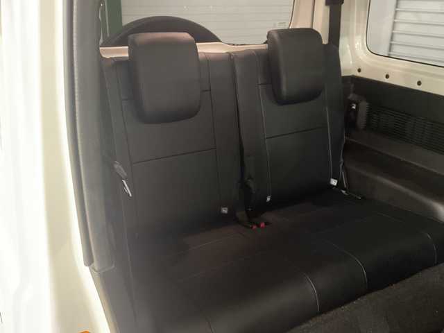 スズキ ジムニー XC 熊本県 2023(令5)年 2.6万km ピュアホワイトP 衝突軽減システム　/社外ナビ(ＣＤ/ＤＶＤ/ＴＶ)　/シートカバー　/前席シートヒーター　/クルーズコントロール/ＬＥＤヘッドライト　/ヒーテッドドアミラー　/オートライト　/背面タイヤ　/前後ドライブレコーダー/4WD　/純正アルミホイール　/純正フロアマット