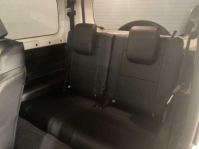 スズキ ジムニー XC 熊本県 2023(令5)年 2.6万km ピュアホワイトP 衝突軽減システム　/社外ナビ(ＣＤ/ＤＶＤ/ＴＶ)　/シートカバー　/前席シートヒーター　/クルーズコントロール/ＬＥＤヘッドライト　/ヒーテッドドアミラー　/オートライト　/背面タイヤ　/前後ドライブレコーダー/4WD　/純正アルミホイール　/純正フロアマット