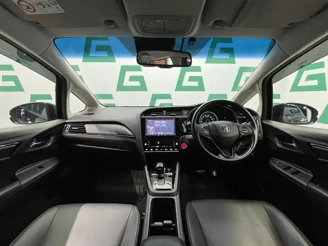 ホンダ シャトル ハイブリッド Z ホンダセンシング 鹿児島県 2020(令2)年 4.9万km クリスタルブラックパール 禁煙車　/ホンダセンシング　/純正８インチナビ　/バックカメラ　/追従型クルーズコントロール　/前席シートヒーター　/ＬＥＤヘッドライト/オートライト/ETC/純正アルミホイール/純正フロアマット/前後ドライブレコーダー/パドルシフト/革巻きステアリング