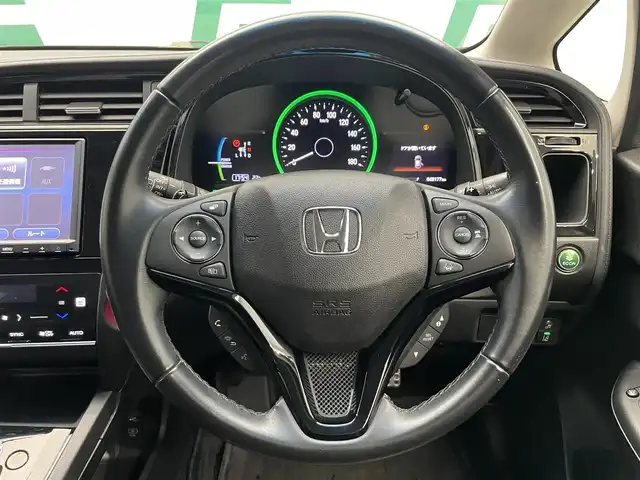 ホンダ シャトル ハイブリッド Z ホンダセンシング 鹿児島県 2020(令2)年 4.9万km クリスタルブラックパール 禁煙車　/ホンダセンシング　/純正８インチナビ　/バックカメラ　/追従型クルーズコントロール　/前席シートヒーター　/ＬＥＤヘッドライト/オートライト/ETC/純正アルミホイール/純正フロアマット/前後ドライブレコーダー/パドルシフト/革巻きステアリング