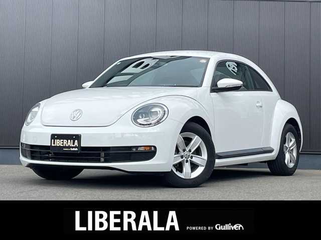 フォルクスワーゲン ザ・ビートル 長野県 2015(平27)年 5万km 白 ストラーダナビ/ 地デジTV/ バックカメラ/ CD/DVD/ bluetooth/ AUX/ HIDヘッドライト/ スマートキー/ プッシュスタート/ ETC/ 純正16インチAW