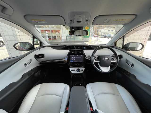 トヨタ プリウス A プレミアム　ツーリングセレ 東京都 2016(平28)年 6.9万km エモーショナルレッド 純正メモリナビ（DSZT-YC4T）/・フルセグTV/DVD/Bluetoothオーディオ/バックカメラ/本革シート/・前席シートヒーター/Toyota Safety Sense P/・プリクラッシュセーフティシステム/・レーンディパーチャーアラート（ステアリング制御付）/・オートマチックハイビーム/・レーダークルーズコントロール（全車速追従機能付）/ブラインドスポットモニター/カラーヘッドアップディスプレイ/AC100V1500W/LEDヘッドランプ/フロアマット/保証書/スペアキー