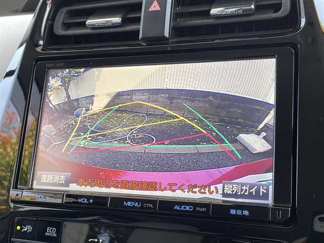 トヨタ プリウス A プレミアム　ツーリングセレ 東京都 2016(平28)年 6.9万km エモーショナルレッド 純正メモリナビ（DSZT-YC4T）/・フルセグTV/DVD/Bluetoothオーディオ/バックカメラ/本革シート/・前席シートヒーター/Toyota Safety Sense P/・プリクラッシュセーフティシステム/・レーンディパーチャーアラート（ステアリング制御付）/・オートマチックハイビーム/・レーダークルーズコントロール（全車速追従機能付）/ブラインドスポットモニター/カラーヘッドアップディスプレイ/AC100V1500W/LEDヘッドランプ/フロアマット/保証書/スペアキー