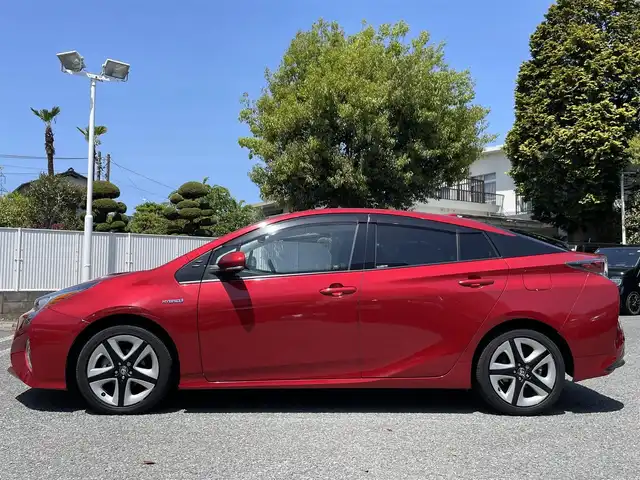トヨタ プリウス A プレミアム　ツーリングセレ 東京都 2016(平28)年 6.9万km エモーショナルレッド 純正メモリナビ（DSZT-YC4T）/・フルセグTV/DVD/Bluetoothオーディオ/バックカメラ/本革シート/・前席シートヒーター/Toyota Safety Sense P/・プリクラッシュセーフティシステム/・レーンディパーチャーアラート（ステアリング制御付）/・オートマチックハイビーム/・レーダークルーズコントロール（全車速追従機能付）/ブラインドスポットモニター/カラーヘッドアップディスプレイ/AC100V1500W/LEDヘッドランプ/フロアマット/保証書/スペアキー