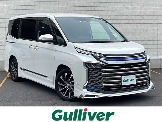トヨタ ヴォクシー ハイブリッド S－Z 茨城県 2023(令5)年 6万km ホワイトパールクリスタルシャイン セーフティセンス/快適利便パッケージ/モデリスタエアロ/純正ディスプレイオーディオ/　　BT/フルセグ/HDMI/バックカメラ/両側パワースライドドア/パワーバックドア/レーダークルーズコントロール/LEDオートライト/オートマチックハイビーム/ハーフレザーシート/シートヒーター /純正17インチアルミホイール/ステアリングヒーター/ステアリングスイッチ/電子パーキングブレーキ/ブレーキホールド/スマートキー/ETC2.0