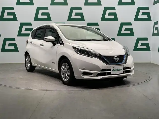 日産 ノート e－パワー X 鹿児島県 2018(平30)年 7.7万km ホワイト 純正ＳＤナビ【ＭＭ３１８Ｄ－Ｗ】　/フルセグＴＶ　/全方位カメラ　/ステアリングリモコン　/デジタルインナーミラー　/ＬＥＤヘッドライト　/オートマチックハイビーム　/ドライブレコーダー　/ＥＴＣ　/電動格納ミラー/禁煙車