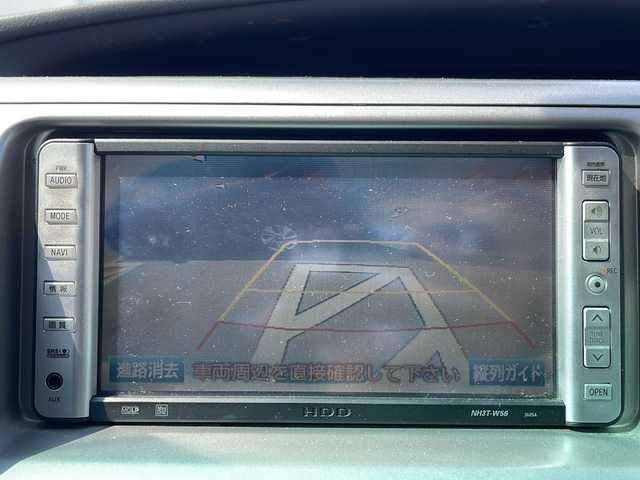 トヨタ エスティマ アエラス 神奈川県 2006(平18)年 13.3万km ホワイトパールクリスタルシャイン 片側パワースライドドア　/社外ＨＤＤナビ　CD/MD/ワンセグテレビ/リアカメラ　/プッシュスタート　/スマートキー　/キセノンヘッドライト　/フォグライト/純正ホイール　/純正フロアマット　/ＥＴＣ　/３列シート　/ウォークスルー　/オットマン
