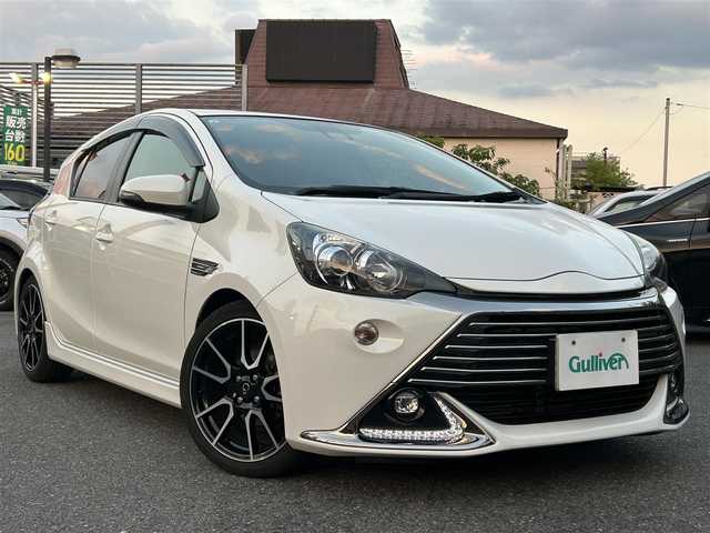 トヨタ アクア G G’s 奈良県 2016(平28)年 10.3万km ライムホワイトパールクリスタルシャイン ディーラー純正ナビ(NHZN-W60G)/BT/CD/TV/DVD/SD//衝突軽減システム/横滑り防止装置/車線はみだし防止装置/バックカメラ/LEDヘッドライト/LEDフォグライト/シートヒーター/フルセグTV/ハーフレザーシート/保証書・取説付き