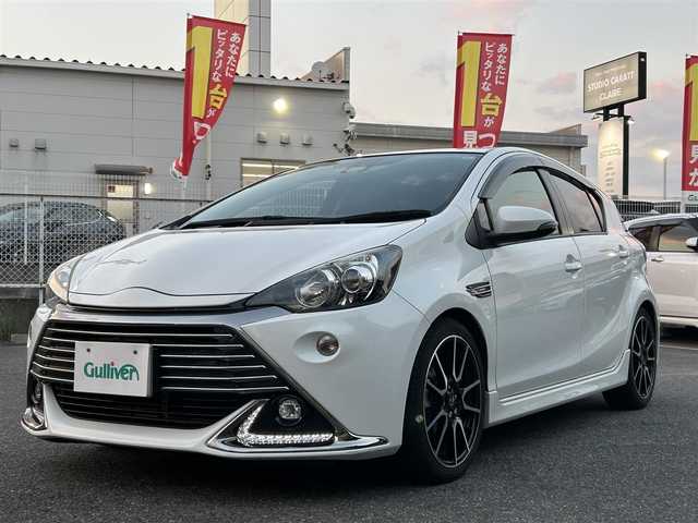 トヨタ アクア G G’s 奈良県 2016(平28)年 10.3万km ライムホワイトパールクリスタルシャイン ディーラー純正ナビ(NHZN-W60G)/BT/CD/TV/DVD/SD//衝突軽減システム/横滑り防止装置/車線はみだし防止装置/バックカメラ/LEDヘッドライト/LEDフォグライト/シートヒーター/フルセグTV/ハーフレザーシート/保証書・取説付き