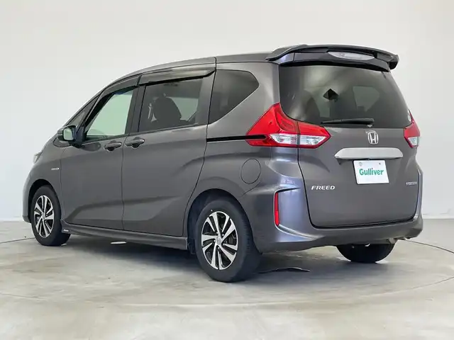 ホンダ フリード ハイブリット G ホンダセンシング 新潟県 2016(平28)年 2.7万km モダンスティールM ワンオーナー/禁煙車/純正メモリナビ/（BT/FM/AM/フルセグTV）/バックカメラ/ステアリングスイッチ/ハーフレザーシート/両側パワースライドドア/ワイパーデアイサー/先行車発進お知らせ装置/サンシェード/純正LEDオートヘッドライト/フロントフォグ/電格ミラー/ドアバイザー/ETC/取扱説明書/保証書