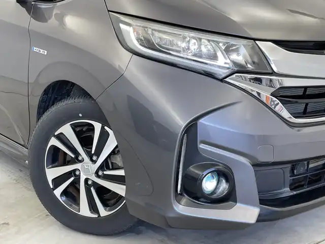 ホンダ フリード ハイブリット G ホンダセンシング 新潟県 2016(平28)年 2.7万km モダンスティールM ワンオーナー/禁煙車/純正メモリナビ/（BT/FM/AM/フルセグTV）/バックカメラ/ステアリングスイッチ/ハーフレザーシート/両側パワースライドドア/ワイパーデアイサー/先行車発進お知らせ装置/サンシェード/純正LEDオートヘッドライト/フロントフォグ/電格ミラー/ドアバイザー/ETC/取扱説明書/保証書