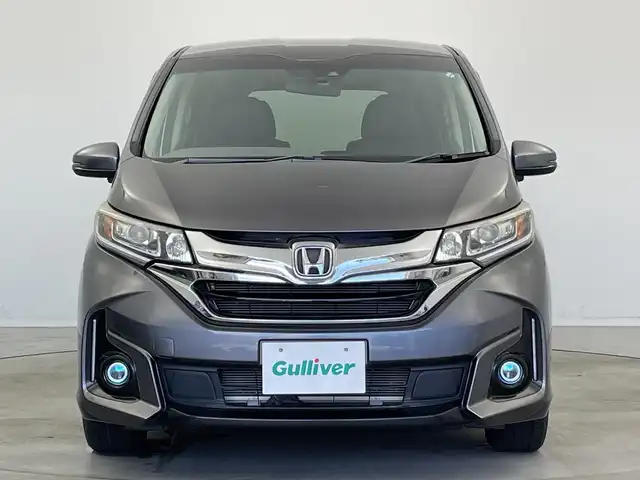 ホンダ フリード ハイブリット G ホンダセンシング 新潟県 2016(平28)年 2.7万km モダンスティールM ワンオーナー/禁煙車/純正メモリナビ/（BT/FM/AM/フルセグTV）/バックカメラ/ステアリングスイッチ/ハーフレザーシート/両側パワースライドドア/ワイパーデアイサー/先行車発進お知らせ装置/サンシェード/純正LEDオートヘッドライト/フロントフォグ/電格ミラー/ドアバイザー/ETC/取扱説明書/保証書