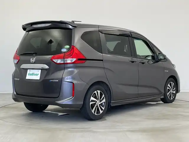 ホンダ フリード ハイブリット G ホンダセンシング 新潟県 2016(平28)年 2.7万km モダンスティールM ワンオーナー/禁煙車/純正メモリナビ/（BT/FM/AM/フルセグTV）/バックカメラ/ステアリングスイッチ/ハーフレザーシート/両側パワースライドドア/ワイパーデアイサー/先行車発進お知らせ装置/サンシェード/純正LEDオートヘッドライト/フロントフォグ/電格ミラー/ドアバイザー/ETC/取扱説明書/保証書