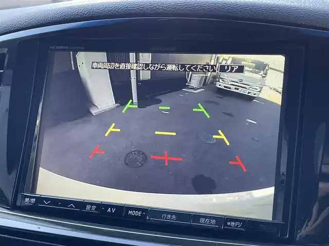 日産 エルグランド 250ハイウェイスター 滋賀県 2013(平25)年 4.9万km ブリリアントホワイトパール 社外８インチナビ/Bluetooth/CD/DVD/USB/フルセグ/ハーフレザー/両側電動スライド/パワーリアゲート/２列目オットマン/フリップダウンモニター/ドラレコ（前後）/バックカメラ/オートライト/プッシュスタート/スマートキー/ステアリングリモコン/ETC