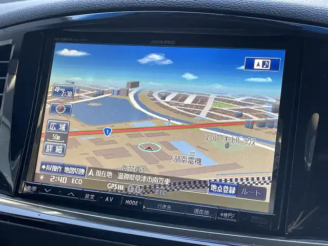 日産 エルグランド 250ハイウェイスター 滋賀県 2013(平25)年 4.9万km ブリリアントホワイトパール 社外８インチナビ/Bluetooth/CD/DVD/USB/フルセグ/ハーフレザー/両側電動スライド/パワーリアゲート/２列目オットマン/フリップダウンモニター/ドラレコ（前後）/バックカメラ/オートライト/プッシュスタート/スマートキー/ステアリングリモコン/ETC