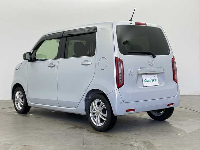 ホンダ Ｎ ＷＧＮ L スタイル+ビター 富山県 2024(令6)年 0.3万km プレミアムサンライトホワイトパール ワンオーナー/社外ナビ【AVIC-RZ812】/（AM/FM/CD/DVD/SD/USB/BT）/フルセグTV/バックカメラ/鉄チン付き夏タイヤ積込/衝突被害軽減ブレーキ/アダプティブクルーズコントロール/レーンキープアシスト/オートマチックハイビーム/LEDヘッドライト/リアパーキングセンサー/ハーフレザーシート/前席シートヒーター/スマートキー×２/プッシュスタート/アイドリングストップ/純正フロアマット/ドアバイザー/取扱説明書/保証書