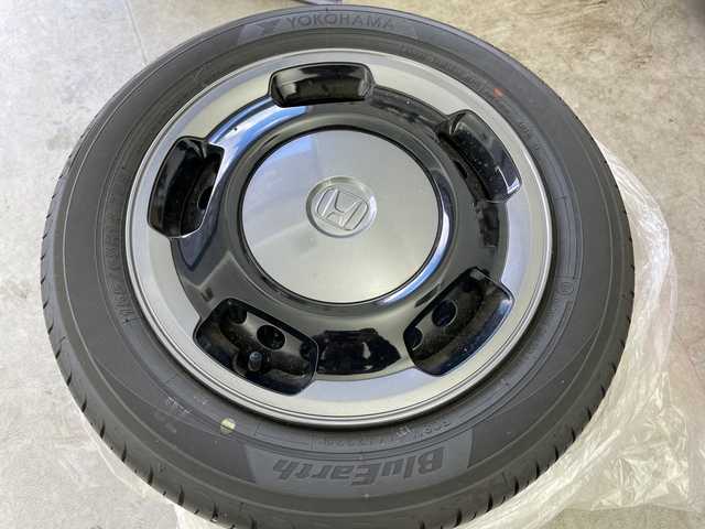 ホンダ Ｎ ＷＧＮ L スタイル+ビター 富山県 2024(令6)年 0.3万km プレミアムサンライトホワイトパール ワンオーナー/社外ナビ【AVIC-RZ812】/（AM/FM/CD/DVD/SD/USB/BT）/フルセグTV/バックカメラ/鉄チン付き夏タイヤ積込/衝突被害軽減ブレーキ/アダプティブクルーズコントロール/レーンキープアシスト/オートマチックハイビーム/LEDヘッドライト/リアパーキングセンサー/ハーフレザーシート/前席シートヒーター/スマートキー×２/プッシュスタート/アイドリングストップ/純正フロアマット/ドアバイザー/取扱説明書/保証書