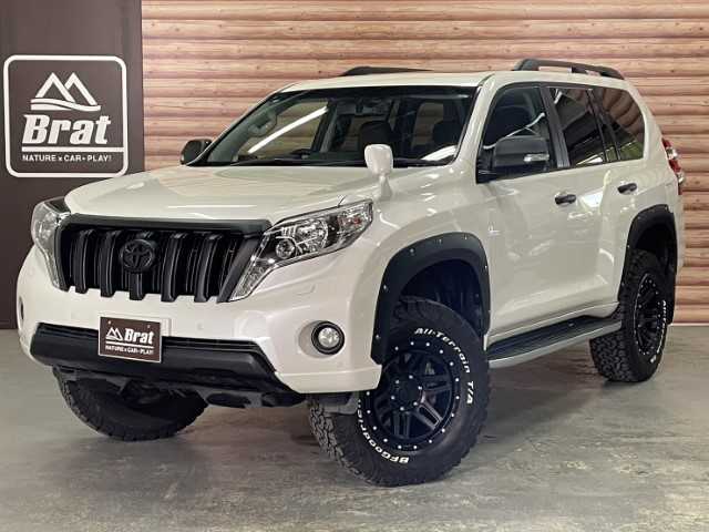 トヨタ ランドクルーザー プラド TX Lパッケージ・G－フロンティア 道北・旭川 2017(平29)年 6.6万km ホワイトパールクリスタルシャイン AIS検査済み【2503029714】/MTモード付/ワンオーナー/ルーフレール/純正LEDヘッドライト/純正サンルーフ/レザーシート/イクリプスSDナビ（社外）/フルセグテレビ（社外）/ドライブレコーダー/ETC/前席パワーシート/前席シートヒーター/センターデフロック/コーナーセンサー/フロントカメラ（社外）/バックカメラ/17インチAW　モンツァジャパン　ハイブロック エルデ（社外）/BFグッドリッチKO2　275/70-17（社外）/リフトアップコイルVer.2（社外）/JAOSフェンダーガーニッシュ（社外）/LEDバックランプ（社外）/社外パーツ取付有