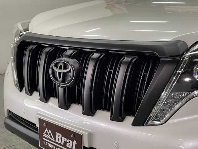 トヨタ ランドクルーザー プラド TX Lパッケージ・G－フロンティア 道北・旭川 2017(平29)年 6.6万km ホワイトパールクリスタルシャイン AIS検査済み【2503029714】/MTモード付/ワンオーナー/ルーフレール/純正LEDヘッドライト/純正サンルーフ/レザーシート/イクリプスSDナビ（社外）/フルセグテレビ（社外）/ドライブレコーダー/ETC/前席パワーシート/前席シートヒーター/センターデフロック/コーナーセンサー/フロントカメラ（社外）/バックカメラ/17インチAW　モンツァジャパン　ハイブロック エルデ（社外）/BFグッドリッチKO2　275/70-17（社外）/リフトアップコイルVer.2（社外）/JAOSフェンダーガーニッシュ（社外）/LEDバックランプ（社外）/社外パーツ取付有