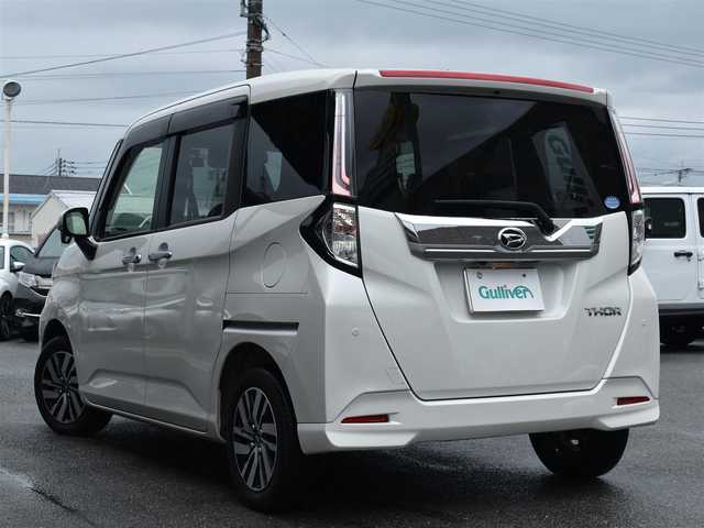 ダイハツ トール カスタムG 大分県 2020(令2)年 3.9万km パールホワイトⅢ 社外ナビ【CN-RA06WD】/　CD/DVD/フルセグTV/BT/パノラマモニター/両側パワースライドドア/スマートキー/プッシュスタート/スマートアシスト/　・衝突警報機能（対車両・対歩行者）/　・衝突回避支援ブレーキ機能/　・ブレーキ制御付き誤発進抑制機能/　・車線逸脱警報機能/　・路外逸脱警報/　・ふらつき警報/　・先行車発進お知らせ機能/　・全車速追従機能付きACC/革巻きステアリング/ステアリングスイッチ/純正LEDヘッドライト/純正14インチアルミ/コーナーセンサー/ETC/保証書/取扱説明書