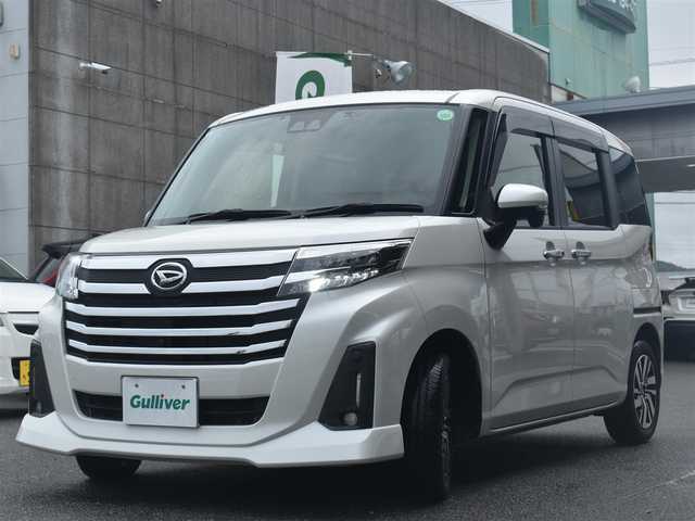 ダイハツ トール カスタムG 大分県 2020(令2)年 3.9万km パールホワイトⅢ 社外ナビ【CN-RA06WD】/　CD/DVD/フルセグTV/BT/パノラマモニター/両側パワースライドドア/スマートキー/プッシュスタート/スマートアシスト/　・衝突警報機能（対車両・対歩行者）/　・衝突回避支援ブレーキ機能/　・ブレーキ制御付き誤発進抑制機能/　・車線逸脱警報機能/　・路外逸脱警報/　・ふらつき警報/　・先行車発進お知らせ機能/　・全車速追従機能付きACC/革巻きステアリング/ステアリングスイッチ/純正LEDヘッドライト/純正14インチアルミ/コーナーセンサー/ETC/保証書/取扱説明書