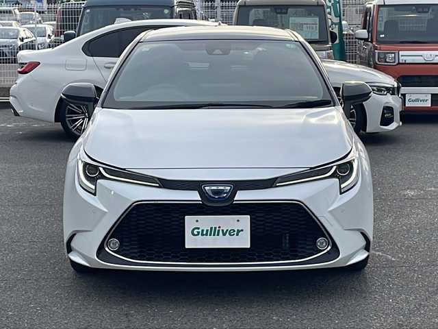 トヨタ カローラツーリング ハイブリッド ダブルバイビー 愛知県 2021(令3)年 1.3万km ブラックマイカ/プラチナホワイトパールマイカ /禁煙//ワンオーナー//純正17AW//純正ナビ機能付きディスプレイオーディオ//BT/フルセグ/Miracast//バックカメラ//ビルトインETC//前後ドライブレコーダー//ハーフレザーシート//LTA/ACC/PCS/BSM//RCTA/PKSB/RSA//前後クリアランスソナー//横滑り防止装置//盗難防止装置//電子制御パーキングブレーキ//ブレーキホールド//本革巻きステアリング//ステアリングスイッチ//LEDオートライト//オートマチックハイビーム//フォグランプ//純正フロアマット//純正ドアバイザー//新車時保証書//取扱説明書//ナビ取扱説明書//ディーラー記録簿　R4.5 R4.11 R5.11 R6.10//スペアスマートキー