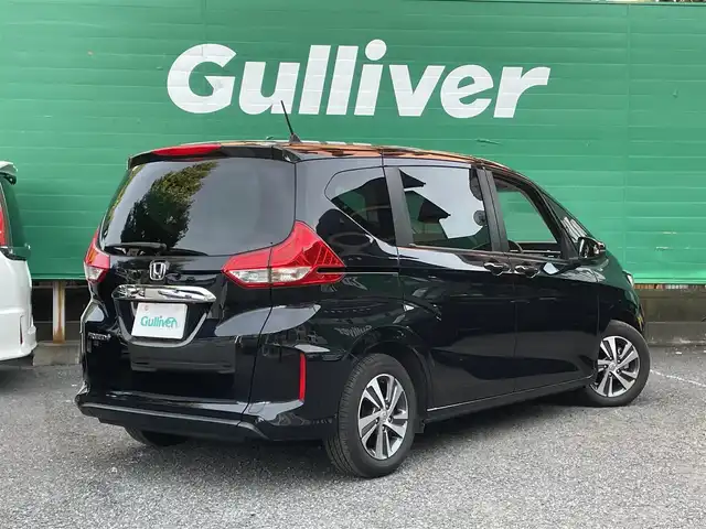 ホンダ フリード＋ G ホンダセンシング 東京都 2022(令4)年 1.3万km クリスタルブラックパール ワンオーナー/Sパッケージ/Cパッケージ/純正SDナビ【VXM-227VFNi】/（フルセグ/BTオーディオ/AppleCarPlay）/バックカメラ/ドライブレコーダー【CS-91FH】/両側パワースライドドア/ホンダセンシング/・アダクティブクルーズコントロール/・車線維持支援システム/・路外逸脱抑制機能/・誤発進抑制機能/前席シートヒーター/LEDヘッドランプ/アクティブコーナリングランプ/ETC/取扱説明書/保証書
