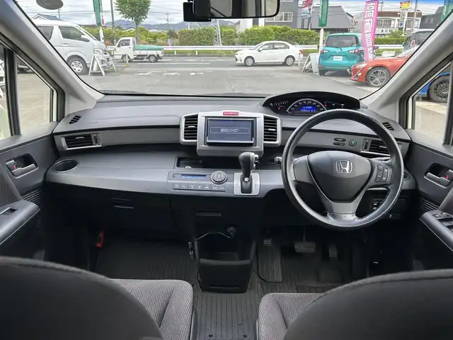 ホンダ フリード G ジャストセレクション 愛知県 2012(平24)年 7.7万km プレミアムホワイトパール 社外メモリナビ/フルセグテレビ/バックカメラ/ウィンカーミラー/クルーズコントロール/両側パワースライドドア/ETC/AUTOライト