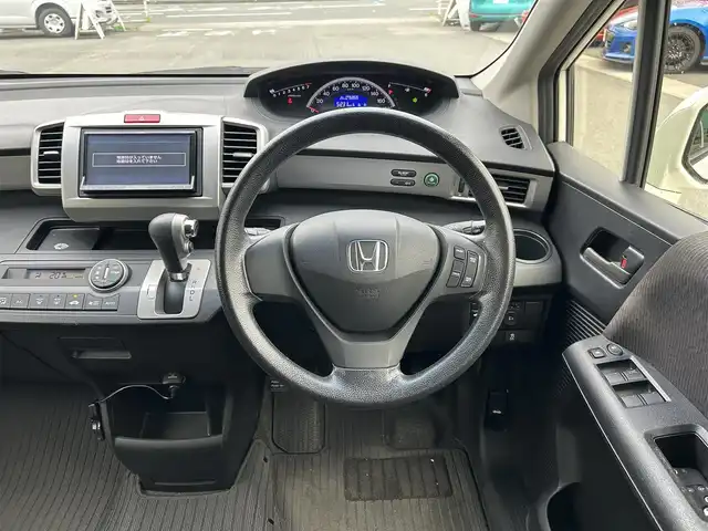 ホンダ フリード G ジャストセレクション 愛知県 2012(平24)年 7.7万km プレミアムホワイトパール 社外メモリナビ/フルセグテレビ/バックカメラ/ウィンカーミラー/クルーズコントロール/両側パワースライドドア/ETC/AUTOライト