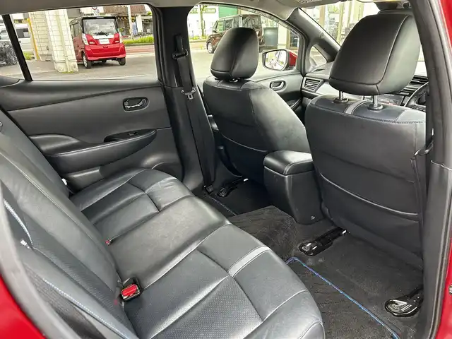 日産 リーフ X 10万台記念車 大分県 2018(平30)年 6.9万km ラディアントレッド 純正SDナビ（QY86-55ND）/Bluetooth/フルセグ/CD/DVD/BOSEサウンド/シートヒーター（D＋N席）/プロパイロット/ステアリングヒーター/純正アルミホイル17インチ/本革シート/純正フロアマット/スペアキー/バックカメラ/ETC/UVカットガラス
