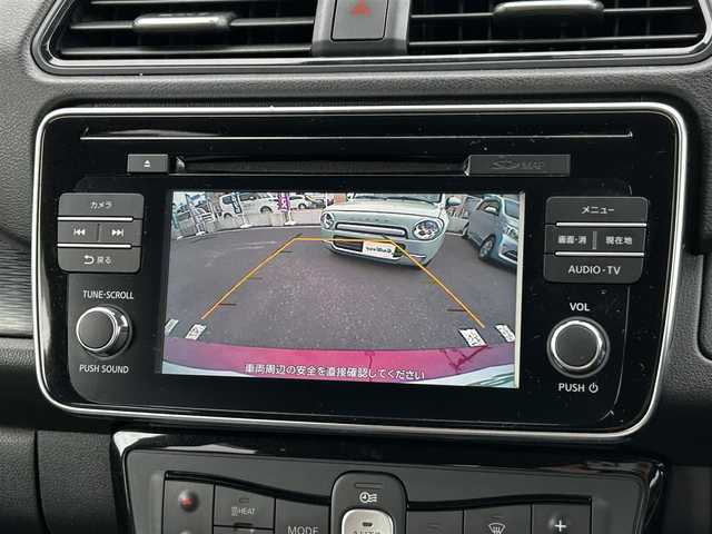 日産 リーフ X 10万台記念車 大分県 2018(平30)年 6.9万km ラディアントレッド 純正SDナビ（QY86-55ND）/Bluetooth/フルセグ/CD/DVD/BOSEサウンド/シートヒーター（D＋N席）/プロパイロット/ステアリングヒーター/純正アルミホイル17インチ/本革シート/純正フロアマット/スペアキー/バックカメラ/ETC/UVカットガラス