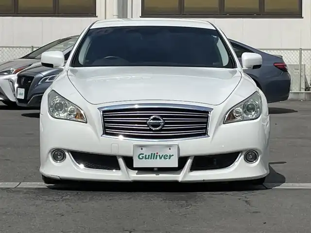 日産 フーガ 250GT タイプP 群馬県 2010(平22)年 7万km クリスタルホワイトパール 純正HDDナビ/　　Bluetooth/フルセグ/CD/DVD/    FM/AM/AUX/セーフティシールドパッケージ/クルーズコントロール/BLITZ車高調/バックカメラ/サイドカメラ/オートライト/レザーシート/全席パワーシート/全席シートヒーター/前席エアーシート/ビルドインETC/スマートキー2本