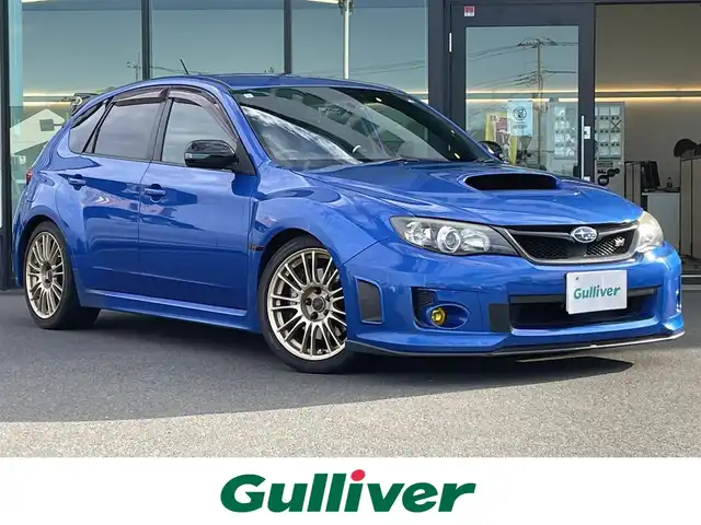 スバル インプレッサ ＷＲＸ STi 東京都 2009(平21)年 7.8万km WRブルーマイカ メーカーＯＰレカロシート/ＨＫＳマフラー/ＨＫＳハイパーＭＡＸ車高調キット/ＳＴＩフロントアンダースポイラー/社外ＬＥＤテールレンズ/ゼロスポーツリヤバンパー/ゼロスポーツエアクリーナー/Ｄｅｆｉブーストメーター/ＭＯＭＯステアリング/Ｐｉｖｏｔスロットルコントローラー/ディスプレイオーディオ/ＥＴＣ2.0/ドライブレコーダー/ＨＩＤヘッドライト/ゼロスポーツフロアマット/プッシュスタート/スマートキー
