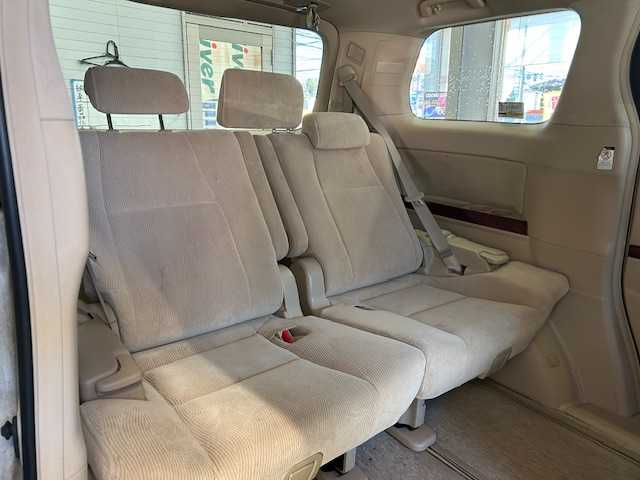 トヨタ ヴェルファイア 2．4V 宮城県 2009(平21)年 18万km ホワイトパールクリスタルシャイン 純正ナビ/AM/FM/BT/CD/DVD/AUX/ワンセグTV/バックカメラ/社外フリップダウンモニター/前席パワーシート/オットマン/両側パワースライドドア/ステアリングスイッチ/MTモード搭載/コーナーセンサー/クルーズコントロール/横滑り防止装置/衝突被害軽減システム/純正フロアマット/ウィンカードアミラー/プッシュスタート/保証書・記録簿・取扱説明書