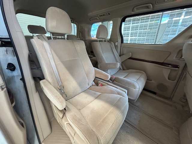 トヨタ ヴェルファイア 2．4V 宮城県 2009(平21)年 18万km ホワイトパールクリスタルシャイン 純正ナビ/AM/FM/BT/CD/DVD/AUX/ワンセグTV/バックカメラ/社外フリップダウンモニター/前席パワーシート/オットマン/両側パワースライドドア/ステアリングスイッチ/MTモード搭載/コーナーセンサー/クルーズコントロール/横滑り防止装置/衝突被害軽減システム/純正フロアマット/ウィンカードアミラー/プッシュスタート/保証書・記録簿・取扱説明書