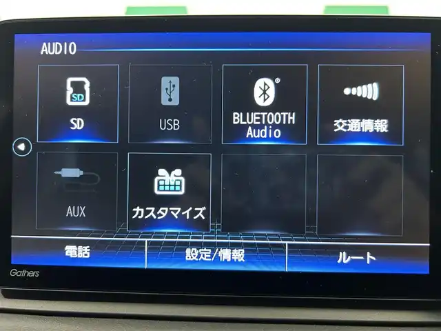 ホンダ ヴェゼル ハイブリッド e:HEV Z 鹿児島県 2023(令5)年 1.8万km プレミアムサンライトホワイトパール Hondaコネクトナビ/(フルセグ/Bluetooth/DVD/CD)/前後ドライブレコーダー/ビルトインETC/ハンズフリーアクセステールゲート/前席シートヒーター/ステアリングヒーター/HondaSENSING/　・衝突軽減ブレーキ（CMBS）/　・誤発進抑制機能/　・後方誤発進抑制機能/　・近距離衝突軽減ブレーキ/　・歩行者事故低減ステアリング/　・路外逸脱抑制機能/　・渋滞追従機能付アダプティブクルーズコントロール（ACC）/　・車線維持支援システム（LKAS）/　・トラフィックジャムアシスト（渋滞運転支援機能）/　・先行車発進お知らせ機能/　・標識認識機能/　・オートハイビーム/電動パーキングブレーキ/ブレーキホールド/純正アルミホイール/純正フロアマット/ドアバイザー