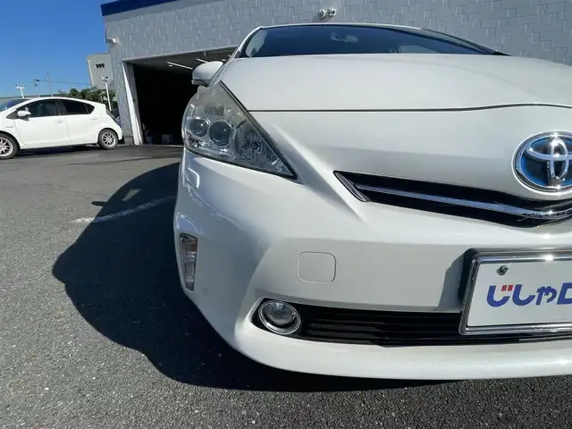 トヨタ プリウス α S チューンブラック 熊本県 2014(平26)年 7.6万km ホワイトパールクリスタルシャイン (株)IDOMが運営する【じしゃロン熊本店】の自社ローン専用車両になります。こちらは現金またはオートローンご利用時の価格です。自社ローンご希望の方は別途その旨お申付け下さい　/純正ナビ（NSZT-W62G）/バックカメラ/フルセグテレビ/DVD/CD/Bluetooth接続/ETC/LEDヘッドライト/オートライト/スマートキー/W＋サイドエアバッグ/カーテンエアバッグ