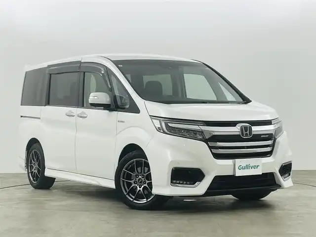 ホンダ ステップワゴン スパーダ ハイブリッド G EX ホンダセンシング 福島県 2018(平30)年 9万km プラチナホワイトパール ホンダセンシング　/・CMBS/・車線逸脱警報/・標識認識機能/・誤発信抑制機能/・レーダークルーズコントロール/純正１０インチナビゲーション/【AM/FM/DVD/CD/Bluetooth/フルセグ】　/全方位カメラ　/ＥＴＣ　/純正フリップダウンモニター　/デジタルインナーミラー　/両側パワースライドドア　/ハーフレザーシート/シートヒーター　/プッシュスタート　/・スマートキー/LEDライト/・オートライト/・フォグライト