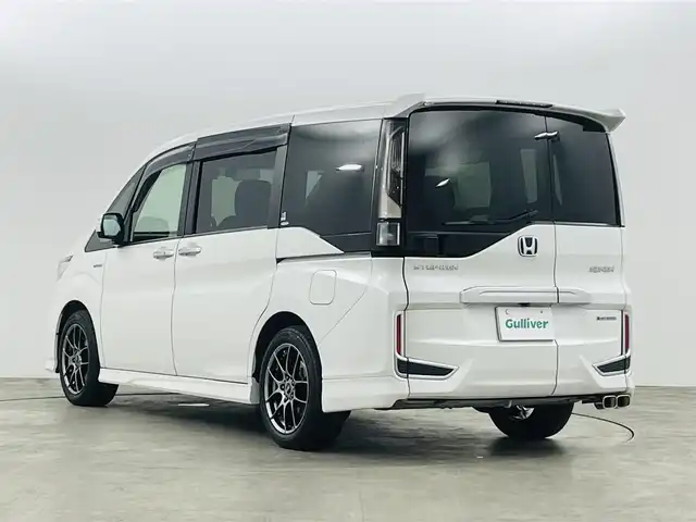 ホンダ ステップワゴン スパーダ ハイブリッド G EX ホンダセンシング 福島県 2018(平30)年 9万km プラチナホワイトパール ホンダセンシング　/・CMBS/・車線逸脱警報/・標識認識機能/・誤発信抑制機能/・レーダークルーズコントロール/純正１０インチナビゲーション/【AM/FM/DVD/CD/Bluetooth/フルセグ】　/全方位カメラ　/ＥＴＣ　/純正フリップダウンモニター　/デジタルインナーミラー　/両側パワースライドドア　/ハーフレザーシート/シートヒーター　/プッシュスタート　/・スマートキー/LEDライト/・オートライト/・フォグライト