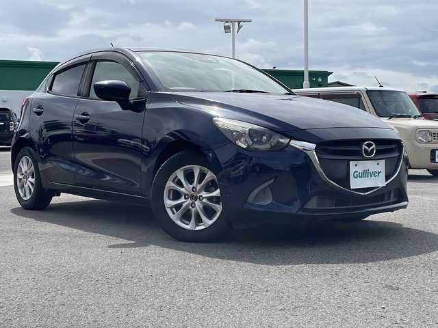 マツダ デミオ 13S 徳島県 2015(平27)年 5.2万km ディープクリスタルブルーマイカ 純正ナビ/BluetoothフルセグTVCDDVD/クルコン/MT付きAT/衝突被害軽減システム/LEDヘッドライト/オートライト/オートエアコン/ETC/純正15AW/純正フロアマット/プッシュスタート/スマートキー/スペアキー
