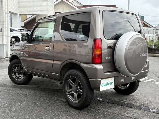 スズキ ジムニー クロスアドベンチャー 埼玉県 2012(平24)年 4.8万km シフォンアイボリーM SDナビ(ワンセグ/DVD/CD/AM/FM/USB)/背面タイヤ/パートタイム4WD/ターボ/ハーフレザーシート/シートヒーター/ETC/ABS/純正フロアマット/純正アルミホイール/ドアバイザー/フォグランプ/パワーステアリング/パワーウィンドウ/保証書/取扱説明書/スペアキー