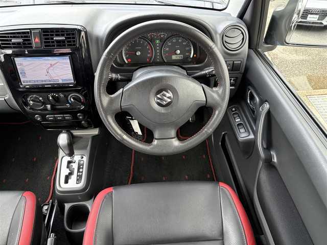 スズキ ジムニー クロスアドベンチャー 埼玉県 2012(平24)年 4.8万km シフォンアイボリーM SDナビ(ワンセグ/DVD/CD/AM/FM/USB)/背面タイヤ/パートタイム4WD/ターボ/ハーフレザーシート/シートヒーター/ETC/ABS/純正フロアマット/純正アルミホイール/ドアバイザー/フォグランプ/パワーステアリング/パワーウィンドウ/保証書/取扱説明書/スペアキー