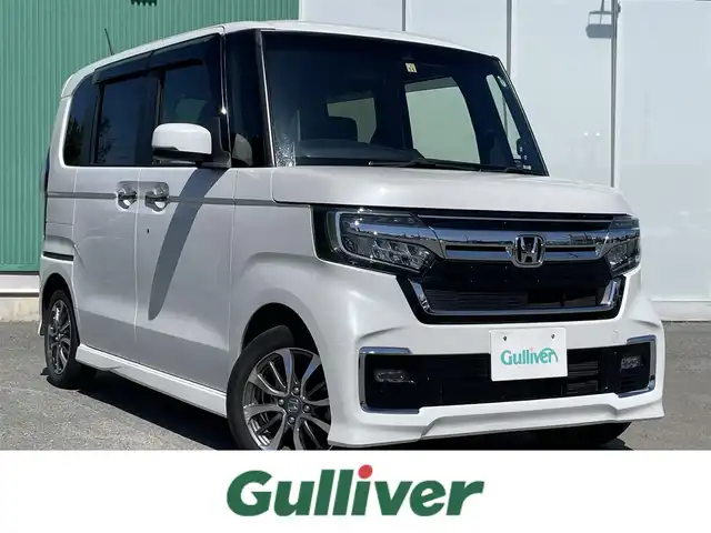 ホンダ Ｎ ＢＯＸ カスタム L 福岡県 2022(令4)年 5万km プラチナホワイトパール ホンダセンシング/横滑り防止機能/レーンキープアシスト/盗難防止機能/衝突被害軽減システム/バックカメラ/純正ナビ/フルセグTV/USB/Bluetooth/CD/ipod/AUX/ETC/純正フロアマット/純正AW/シートヒーター/片側パワースライドドア/イージードアクローザー/ベンチシート/チップアップシート/ACC