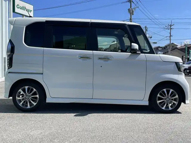 ホンダ Ｎ ＢＯＸ カスタム L 福岡県 2022(令4)年 5万km プラチナホワイトパール ホンダセンシング/横滑り防止機能/レーンキープアシスト/盗難防止機能/衝突被害軽減システム/バックカメラ/純正ナビ/フルセグTV/USB/Bluetooth/CD/ipod/AUX/ETC/純正フロアマット/純正AW/シートヒーター/片側パワースライドドア/イージードアクローザー/ベンチシート/チップアップシート/ACC