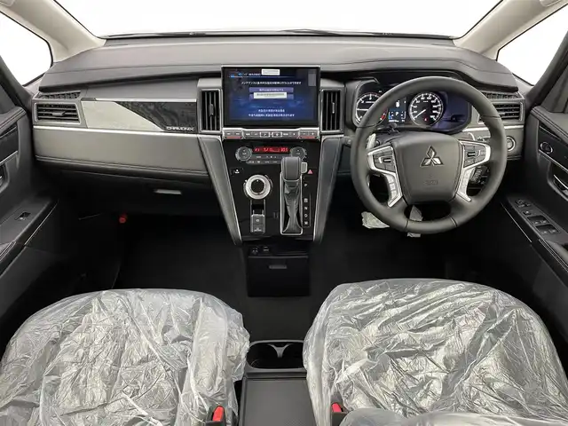 三菱 デリカＤ：５ シャモニー 宮城県 2025(令7)年 0.1千km グレーⅡ CHAMONIX (8人)　4WD　e-Assist/オリジナルナビ取付パッケージ＋リアモニター取付パッケージ(25/300)　ステップレス　（8人）D:5専用11型ナビゲーション(322/300)/登録済未使用車/アルパイン１１型ナビ/ＨＤＭＩ入力端子/専用ハーフレザーシート/パワーバックドア/パワーシート/シート／ステアリングヒーター/ＢＳＭ/アダプティブクルーズコントロール/フルセグＴＶ/専用１８ＡＷ